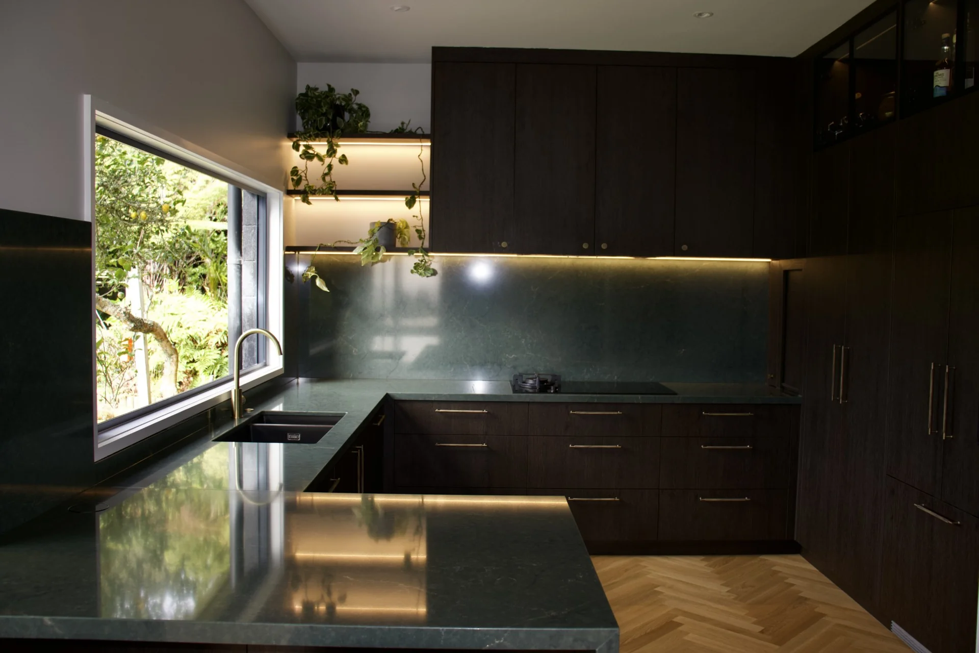 Kitchen and interior design project with refined cabinetry and warm lighting