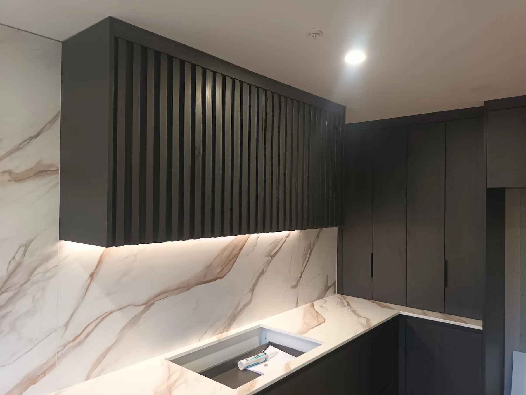 Completed kitchen interior with considered finishes and natural light
